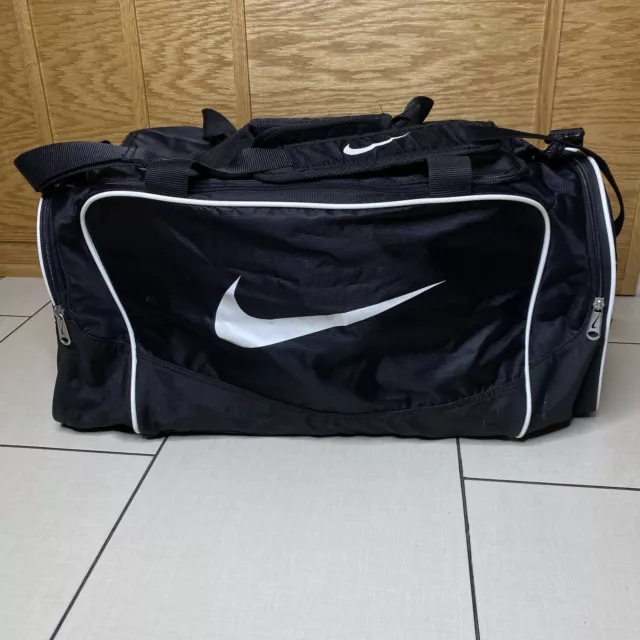 Nike Brasilia Duffel Bag Gym Travel Carry On Luggage Black White Swoosh Nike Brasilia Duffel Bag Gym Travel Carry On Luggage Black White Swoosh