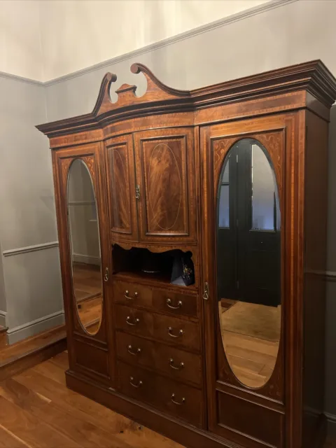 antique wardrobe with drawers And mirror
