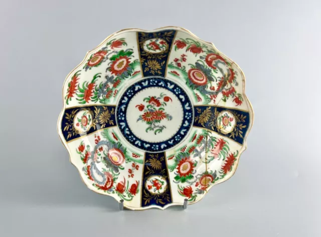 A c1770 1st Period Worcester deep saucer in the 'Queen's Pattern'.