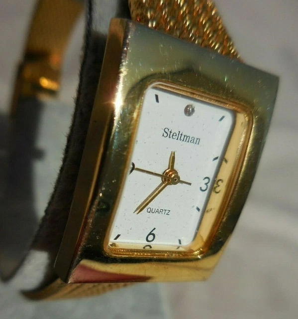 Montre STELTMAN Publicité 3 Suisses - Cadran Blanc, Bracelet Acier - Très Bon état