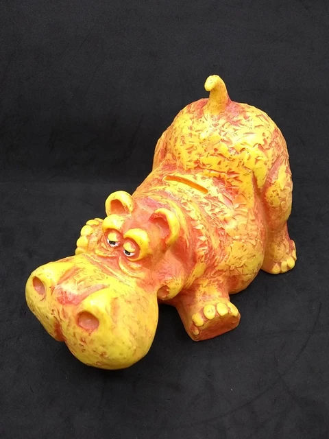 Vtg whimsical plastic Orange Yellow Hippopotamus coin by Bank Royalty Ind.?