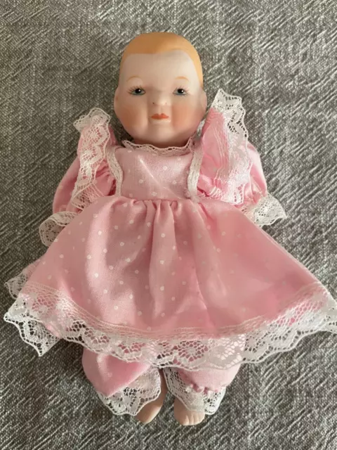 Bisque Baby Doll 5" Tall Moveable string arms & Legs Pink Polka Dot Dress