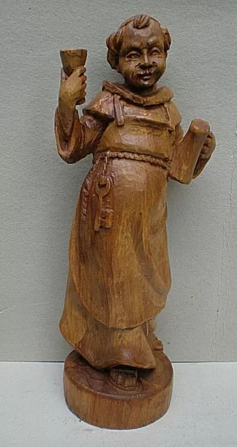 Very Large Black Forest Swiss Carving of a Monk with Raised Glass