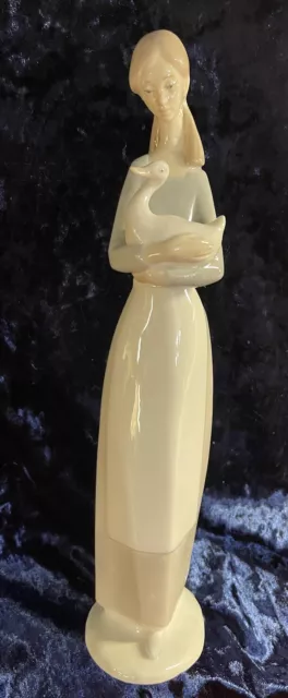 NAO By Lladro Girl in Apron Holding Duck/Goose 10.75" Tall