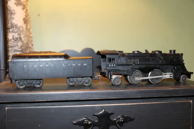 Lionel Post War O gauge steam engine w/cars, light, forward and reverse. TESTED!