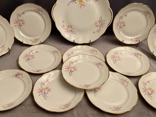 Service à dessert en porcelaine de Limoges à décor floral plat 12 assiettes