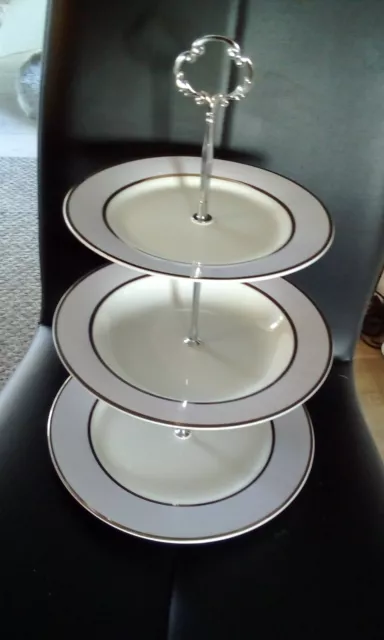 Unusual finesse fine porcelain   3 tier cake stand  (last one )