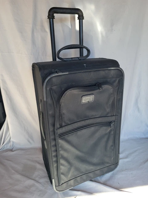 TUMI 23"  Black Nylon Carry On luggage rolling wheeled suitcase upright .