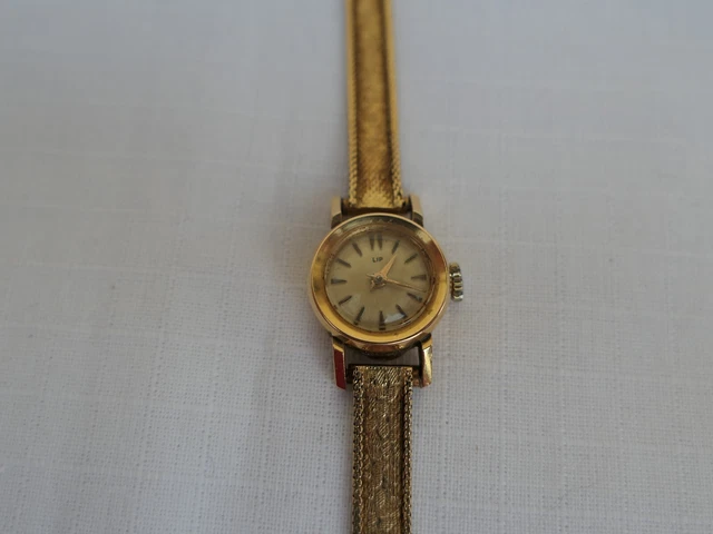 Montre Ancienne Pour Dame L'HOSTE Mécanique Manuelle - Cadran Beige Ovale - Fonctionne