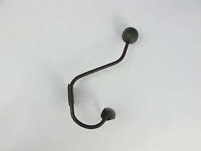 Vintage French coat and hat hook. Rusty metal with wooden atomic ball hook