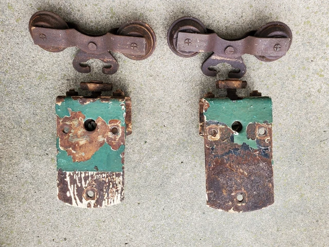 Two (2) Antique CannonBall Barn Door Rollers Hangers with Brackets Rusty Pair
