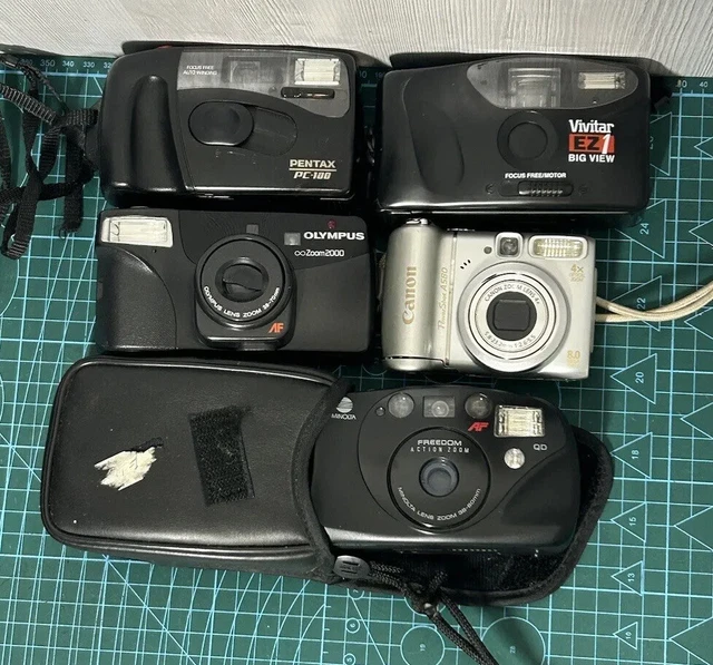 Lote de 5 cámaras 4 películas/1 digitales incluyendo Olympus, Pentax, Minolta - defectuosa