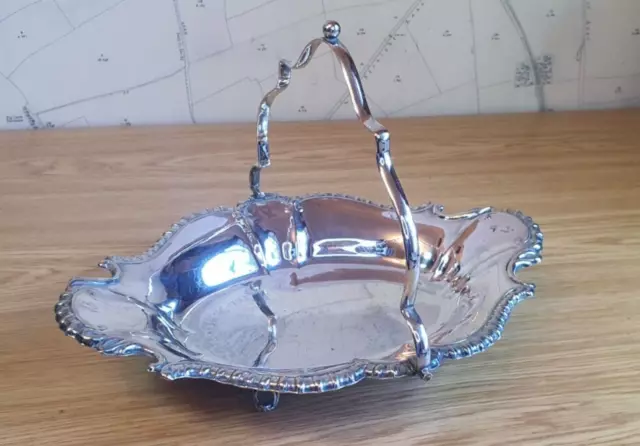 Vintage EPNS silver plated server with foldable handle on 4 feet over 12" long