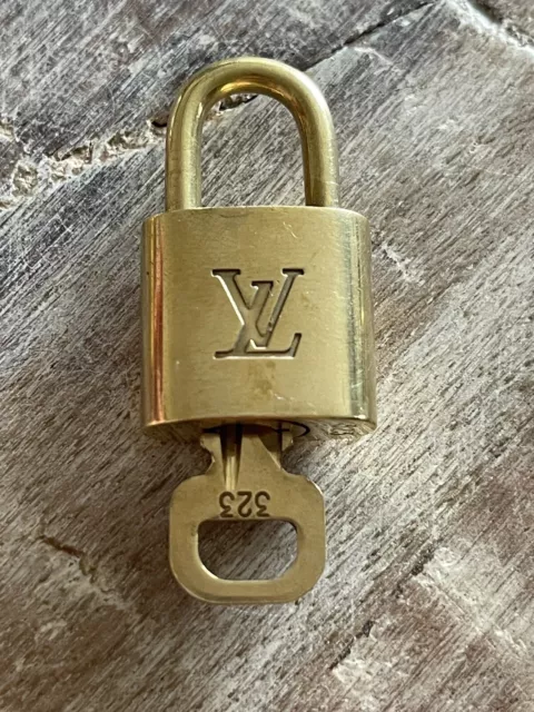 LOUIS VUITTON Polished Silver Lock and Key Set 140464