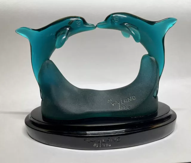 R Wyland Kissing Dolphins sculpture R Wyland Kissing Dolphins sculpture