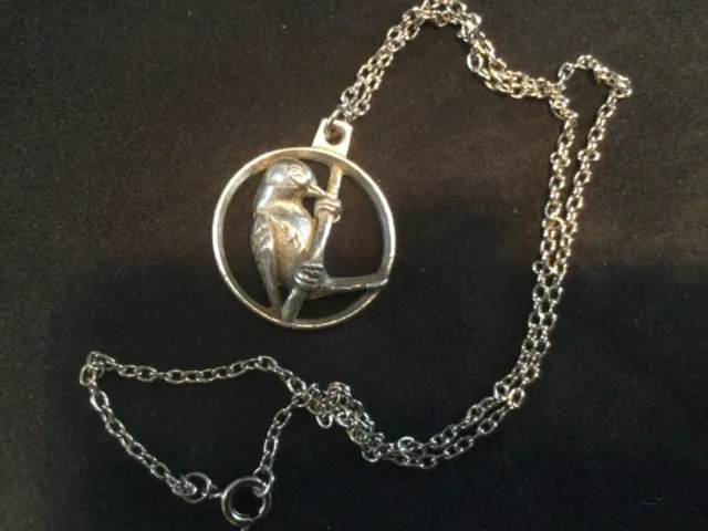 St Justin pewter pendant and 46cm chain, bird on a branch
