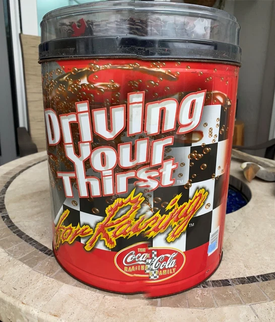 38oz Coca Cola Drive your thirst racing tin with puzzle