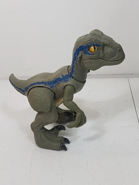 Jurassic world velociraptor blue chomp and roar mask as is. -Jurassic world T-Rex mask with sounds and lights