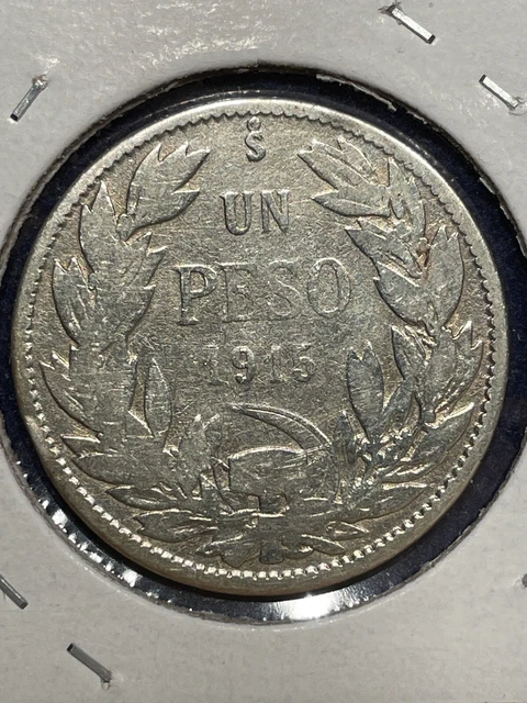 1915 So - Silver (.2038) Un Peso Coin from Chile, circulated