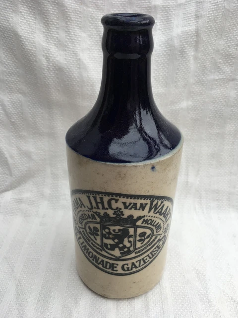 Blue top lemonade ginger beer mineral soda stoneware bottle