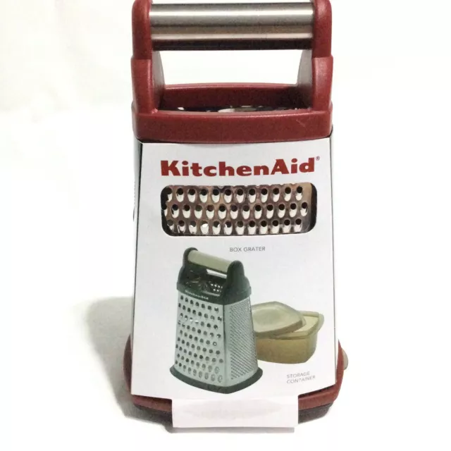 https://www.picclickimg.com/LGAAAOSwA1lg-Pqt/KitchenAid-Stainless-Steel-Box-Grater-With-Covered-Container.webp