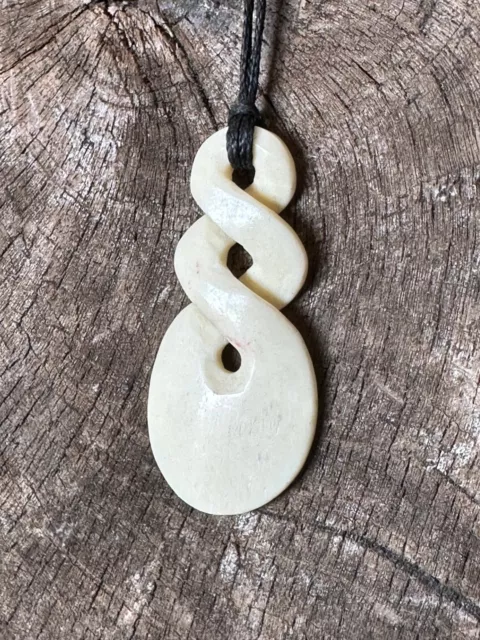 New Zealand Swirl Pendant on Black Cord …beautiful collection and accent piece