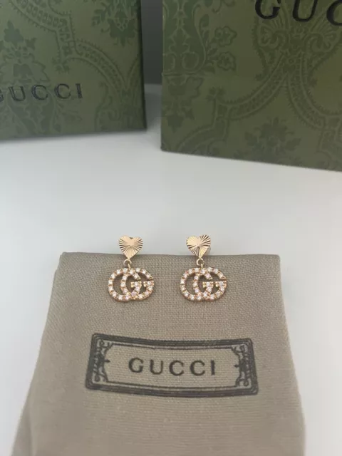 Goldene Gucci Ohrringe / Ohrstecker mit weißen Kristallen mit orig. Verpackung