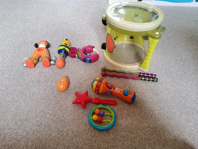 B. TOYS Parum Pum Toy Drum Kit with 7 Musical Instruments for