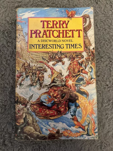 Interesting Times : Discworld # 17 : Terry Pratchett .