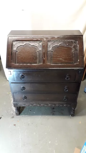 Vintage dark oak bureau, drop front, three drawers, made by Stanley Wood