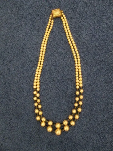 Alte 2-reihige  Perlenkette unecht Modeschmuck  altweiß-schwarz L: ca. 58 cm