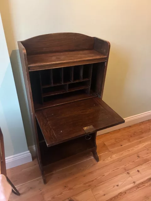 Slimline dark wood bureau, converts to writing desk