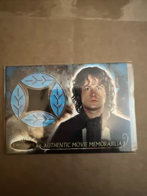 Topps Lord Of The Rings Evolution Pippin’s Travel Cloak Movie Memorabilia Card