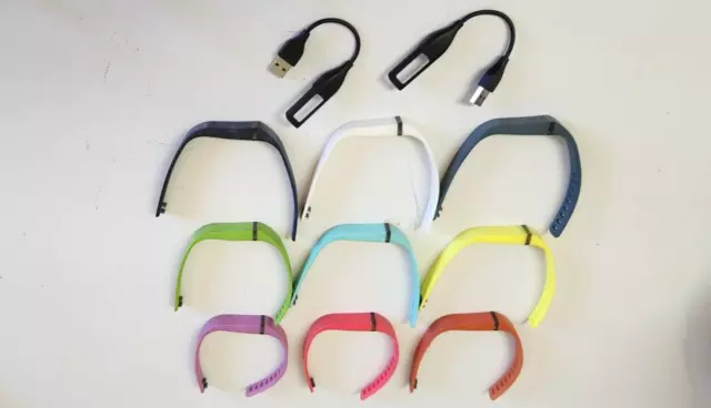 Silicone Fit Bit Watch Bands (9) Various Coulous  and Two Chargers.