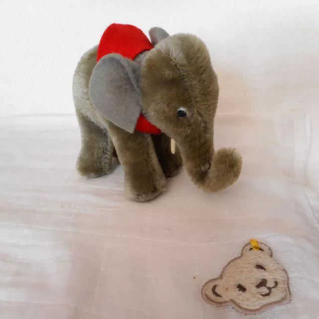 Steiff Elefant 0500/10 grau rote Satteldecke 10cm stehend KF schöner Zustand