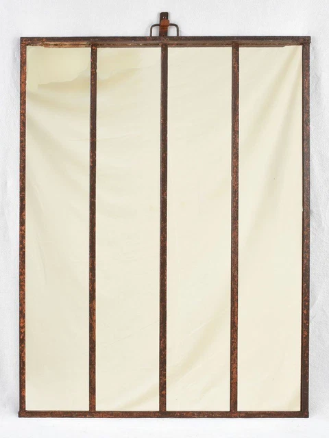 19th century wrought iron framed paneled mirror with red patina 40½" x 52¾"