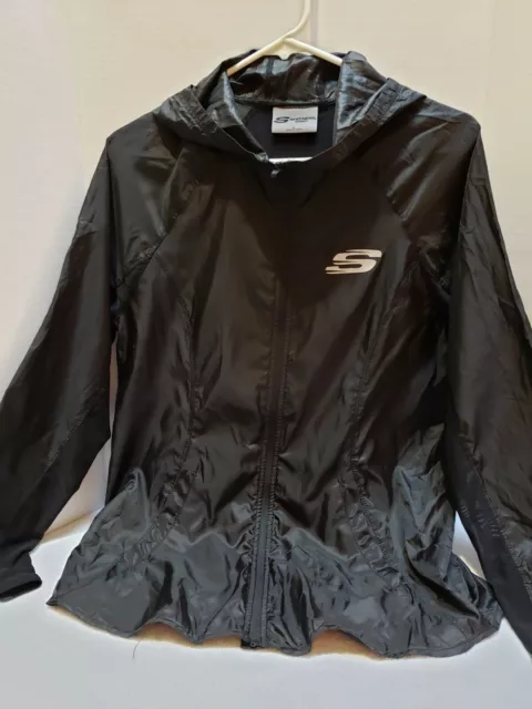 Chaqueta con capucha para correr Skechers Damas L con cremallera completa mangas transpirables negras