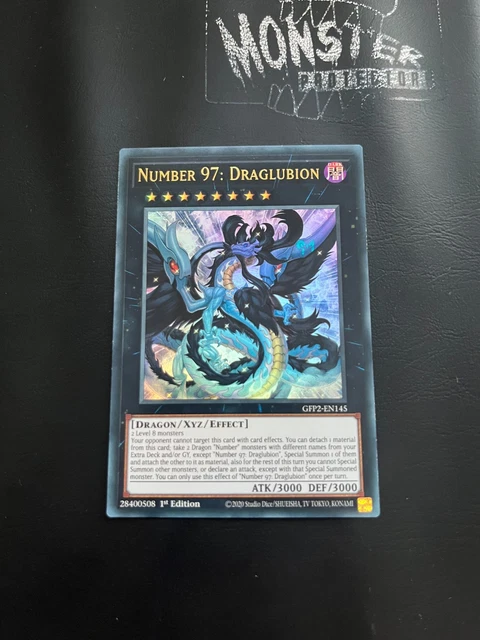 what is a ghost rare pokemon card SGC 8.5 NM-MT+ 1st Edition Dark Magician GFTP-EN128 (Ghost Rare) main image 0