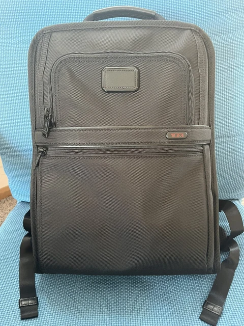 Tumi expandable backpack plus accessories