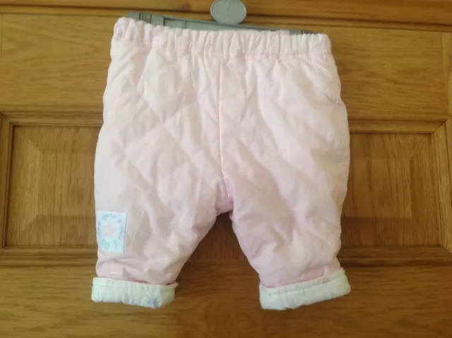 Pantaloni imbottiti vintage per bambine rosa pallido. Età 0 - 3 mesi.