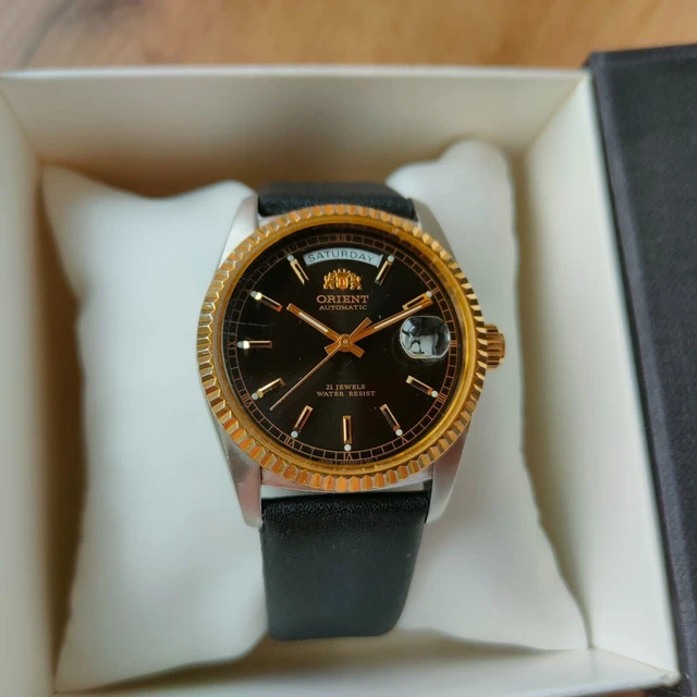Orient president discount gold black