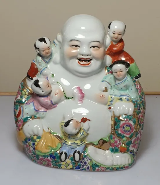 A Fine Quality Famille Rose Porcelain Laughing Buddha With Children. Signed.