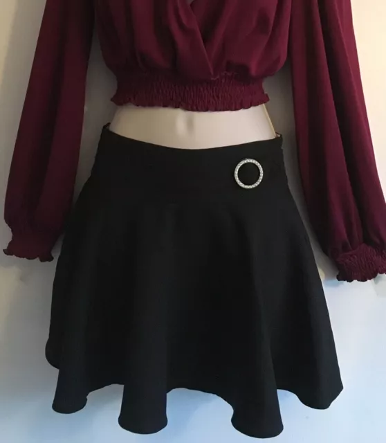 Mini jupe courte Internacionale noire diamant boucle ceinture taille 6/8