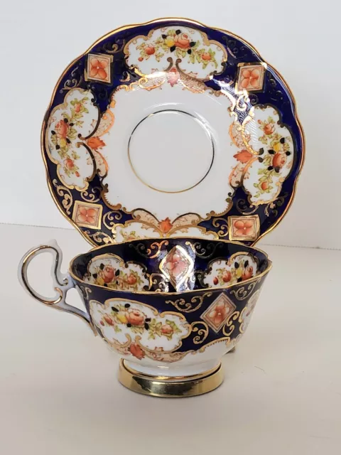 Stunning Royal Albert Crown China Heirloom Footed Teacup & Saucer England