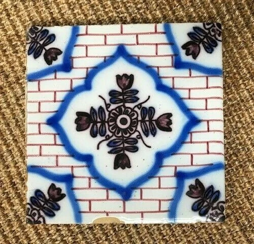 Antique 18C Polychrome Dutch  Delft Tile Featuring A Floral Pattern