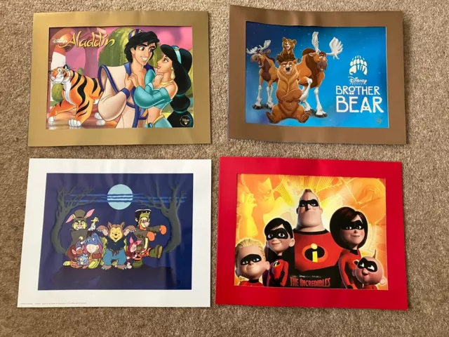 4 X Disney Store Lithograph Prints. 11x14". Brother Bear, Aladdin, Incredibles