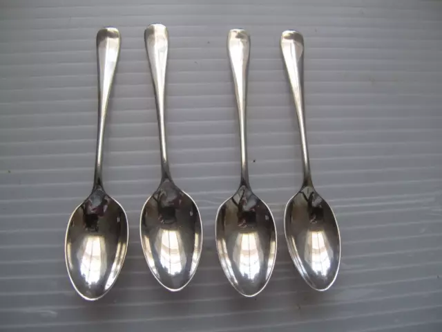 Four Mappin & Webb silver rat-tail coffee spoons - Sheffield 1930 & 1931