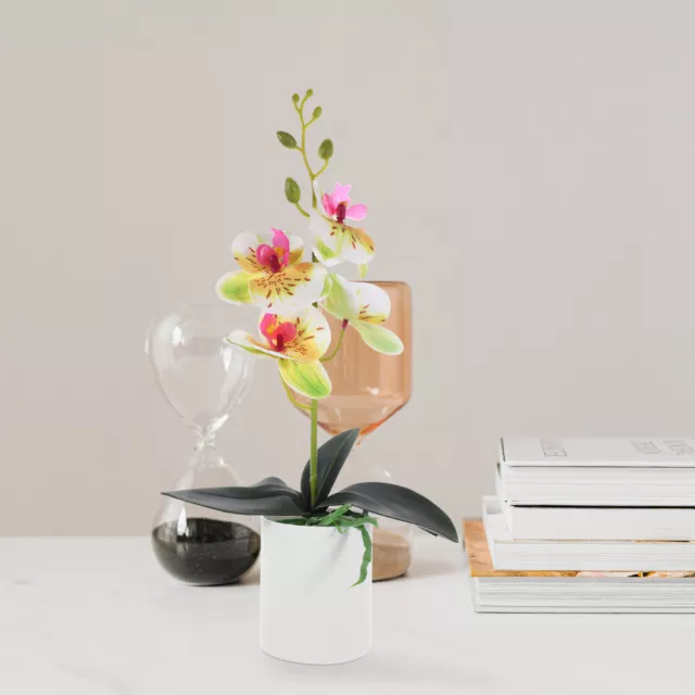 Orquídea sintética blanca en maceta - decoración realista de plantas falsas