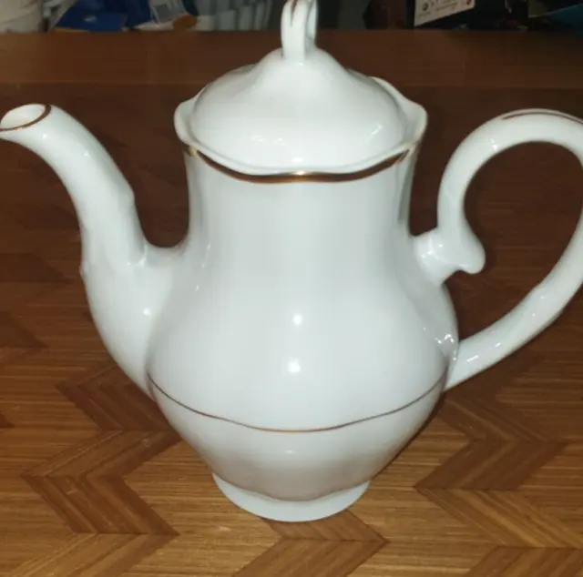 https://www.picclickimg.com/LYgAAOSwbYFlkPt2/Vintage-Karolina-Tea-Coffee-Pot-Poland-FREE-POSTAGE.webp
