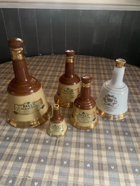 Collection of 5 Wade Bell-Shaped Bell's Bells Whisky Empty Bar Decanters Bottles